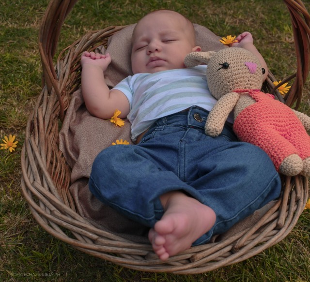 Sesión familiar — bebé sonriendo
